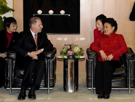 Chinese State Councillor Liu Yandong (1st R) meets with International Olympic Committee (IOC) President Jacques Rogge (2nd R) in Hong Kong, south China, on Dec. 5, 2009. Liu arrived in Hong Kong Saturday to attend the opening ceremony of the 5th East Asian Games.(Xinhua/Lui Siu Wai)