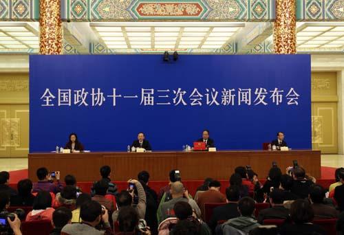 Zhao Qizheng (2nd, R), spokesman of the Third Session of the 11th Chinese People's Political Consultative Conference (CPPCC) National Committee, speaks during a news conference on the CPPCC session at the Great Hall of the People in Beijing, capital of China, March 2, 2010.(Xinhua/Ding Lin)