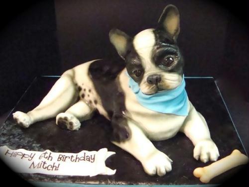 More incredible edible cakes by Debbie Goard.This cute dog may look tasty enough to win Crufts this weekend - but...