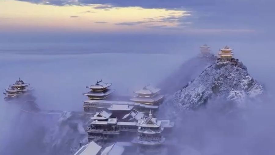 Snowfall creates dreamy scenes on mountain tops in Henan