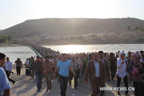  دخول أكثر من 21 الف لاجئ سوري شمالي العراق