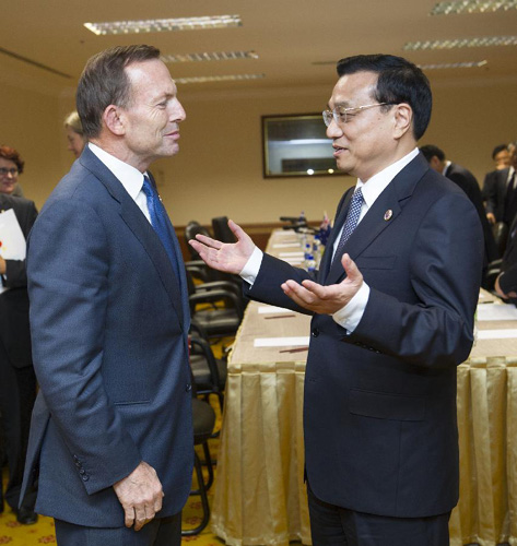 10月9日，国务院总理李克强在文莱斯里巴加湾市会见澳大利亚总理阿博特。记者黄敬文摄