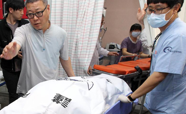 Sube a 59 número de muertos mientras 243 personas siguen desaparecidas en ferry surcoreano