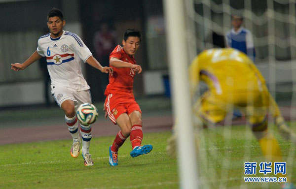 China derrota a Paraguay por 2-1 en el Estadio de Helong con goles de Zheng Zhi y Wu Lei