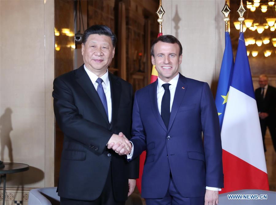 Chinese President Xi Jinping (L) meets with French President Emmanuel Macron in the southern French city of Nice on March 24, 2019. (Xinhua/Ju Peng)