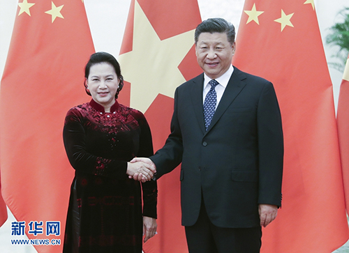7月12日，国家主席习近平在北京人民大会堂会见越南国会主席阮氏金银。 新华社记者姚大伟摄