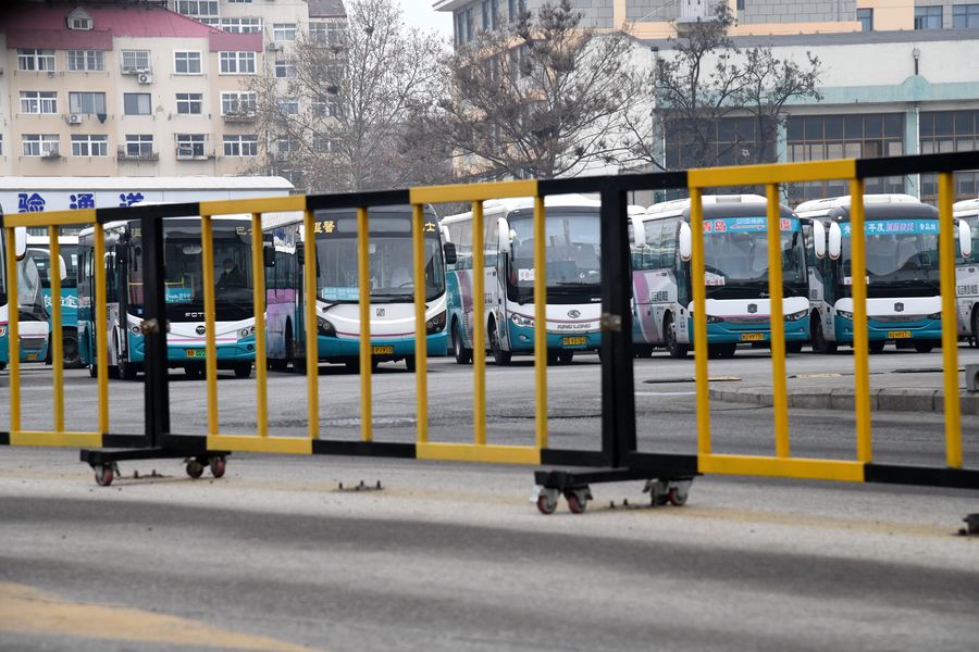 Photo taken on Jan. 27, 2020 shows suspended buses at a bus terminal in Qingdao, east China