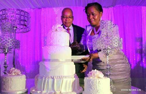 cake during their wedding ceremony in Nkandla KwaZuluNatal South Africa