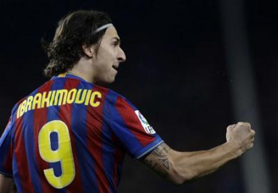 Barcelona's Zlatan Ibrahimovic reacts after scoring a goal during their Spanish first division soccer match against arch rivals Real Madrid at the Camp Nou stadium in Barcelona November 29, 2009. (Xinhua/Reuters Photo)