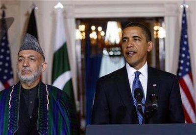 U.S. President Barack Obama speaks to the media in the Grand Foyer of the White House with Afghan President Hamid Karzai (L) at his side after their meeting with Pakistan's President Asif Ali Zardari in Washington May 6, 2009. (REUTERS/Kevin Lamarque)