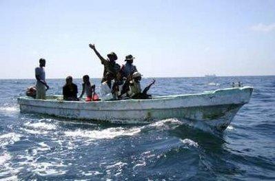 Somali coastguards patrol the Indian Ocean waters near the capital Mogadishu December 6, 2009. They're holding an Indian boat with 13 crew members captive.