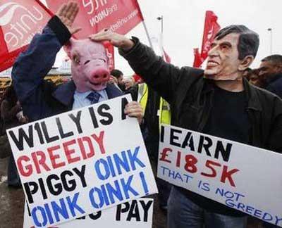 British Airways cabin crew and supporters hold placards during a rally near Heathrow Airport in west London March 20, 2010. REUTERS/Luke MacGregor