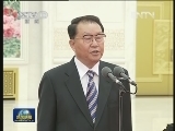 李长春会见第14届残奥会中国体育代表团全体成员