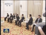 贾庆林会见柬埔寨太后莫尼列 国王西哈莫尼和首相洪森