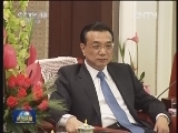 李克强会见梁振英、崔世安