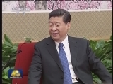 习近平会见梁振英、崔世安