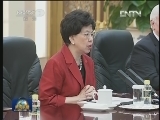 习近平会见世界卫生组织总干事