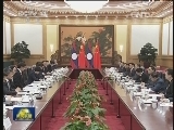 习近平同老挝人民革命党中央总书记、国家主席朱马里会谈