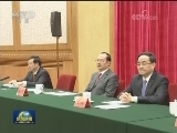 王沪宁会见新闻工作者代表并讲话