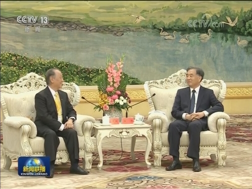 汪洋会见郁慕明一行