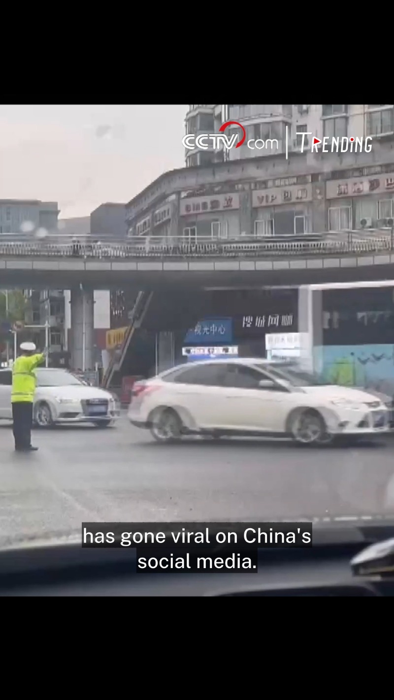traffic police officer directs traffic with dance moves in china
