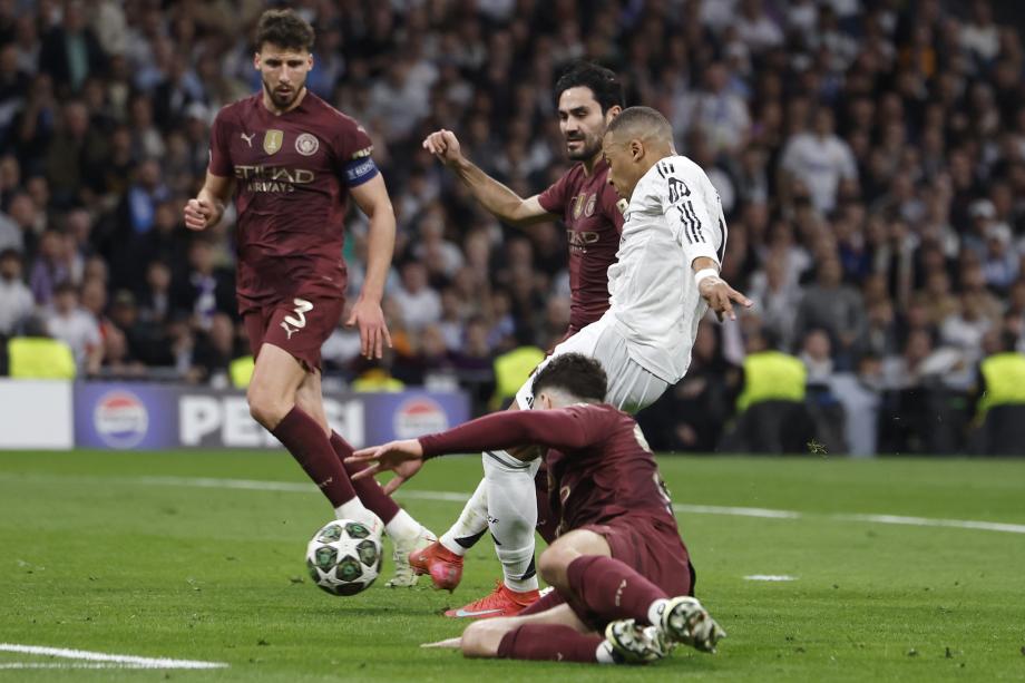 欧冠-姆巴佩戴帽 皇马3-1曼城总比分6-3晋级16强