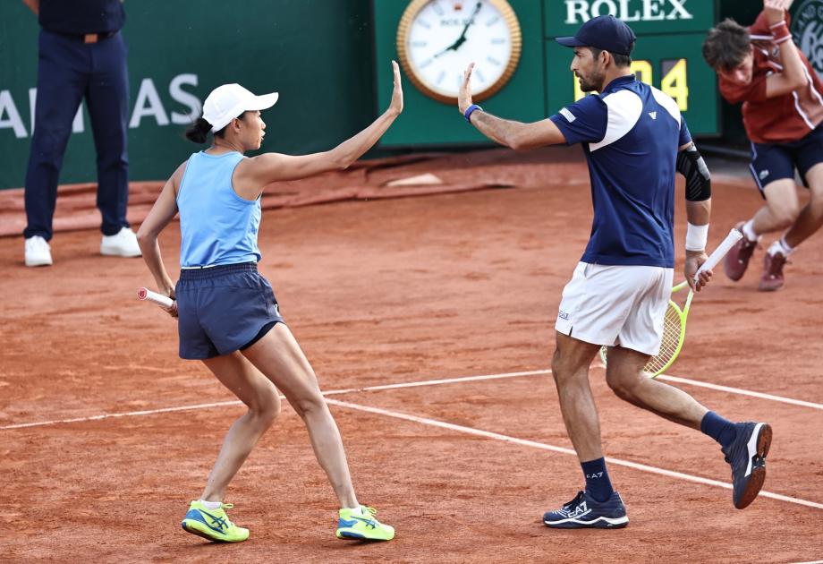 [图]张帅组合2-0横扫晋级 闯入法网混双四强体育录像/图片