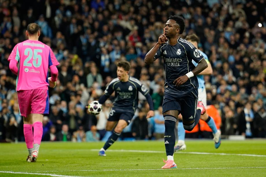 [图]维尼修斯双响B席送点 皇马总分5-1曼城进八强股票配资平台个人代理