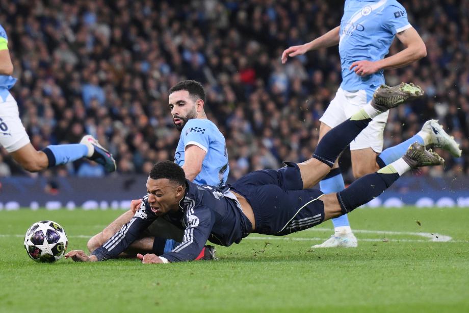 维尼修斯双响B席送点 皇马总分5-1曼城进八强