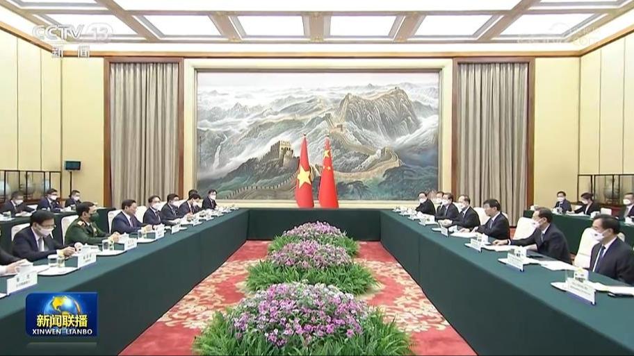 王沪宁会见越南总理