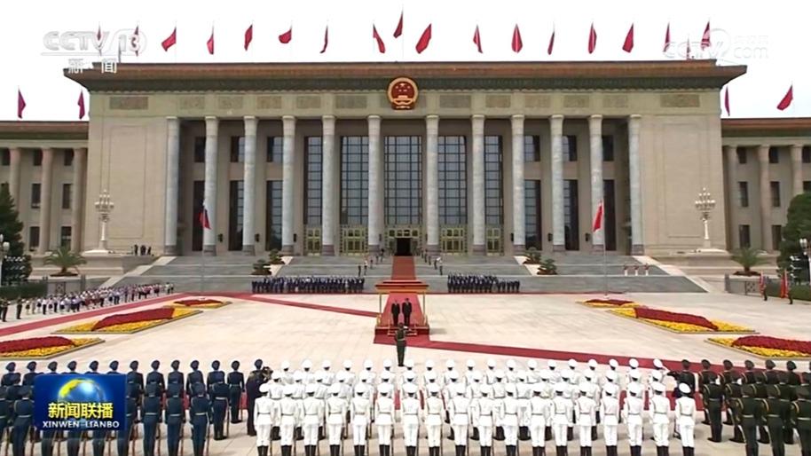 习近平举行仪式欢迎俄罗斯总统访华