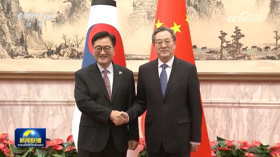 丁薛祥会见韩国国会议长