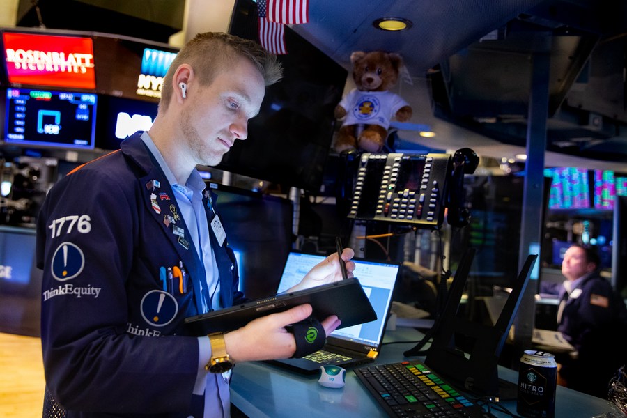 A trader works at the New York Stock Exchange in New York, the United States, Feb. 28, 2022. (Allie Joseph/NYSE/Handout via Xinhua)