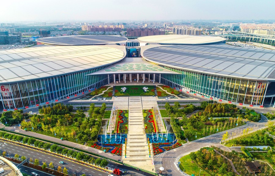 This aerial photo taken on Oct. 31, 2021 shows the Natio<em></em>nal Exhibition and Co<em></em>nvention Center in Shanghai, east China. (Photo by Jiang Zhongcheng/Xinhua)