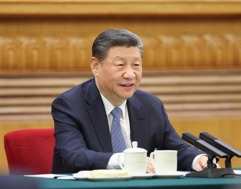 Chinese President Xi Jinping, also general secretary of the Communist Party of China Central Committee and chairman of the Central Military Commission, takes part in a deliberation with his fellow deputies from the delegation of Jiangsu Province at the second session of the 14th National People’s Congress (NPC) in Beijing, capital of China, March 5, 2024. (Xinhua/Ju Peng)