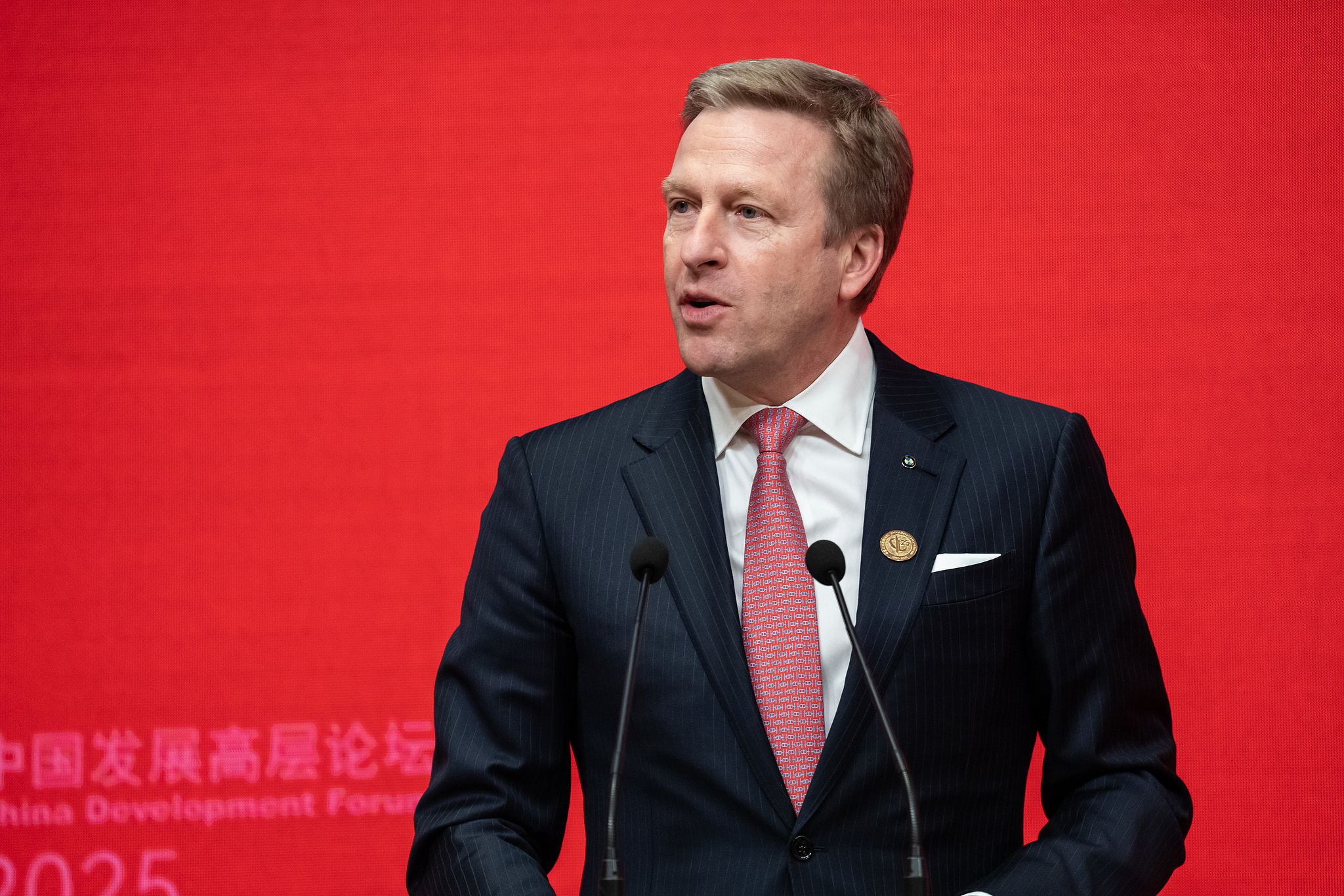 Oliver Zipse, board chairman of BMW AG, addresses attendees at the 2025 China Development Forum, March 23, 2025. 