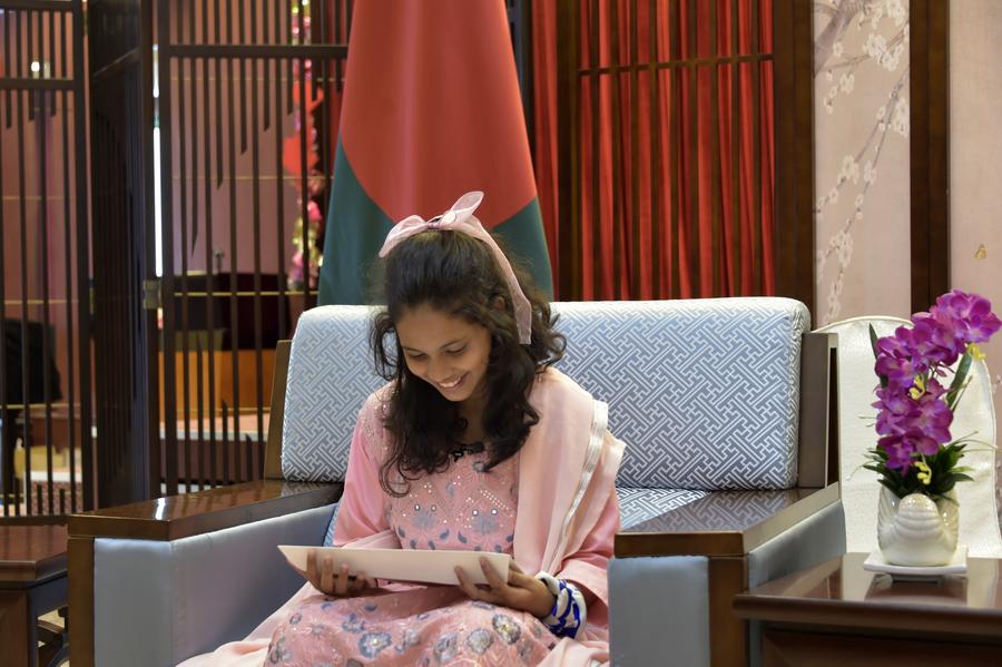 Alifa Chin reads a reply letter from Chinese President Xi Jinping in Dhaka, Bangladesh, on May 29, 2023. (Xinhua)